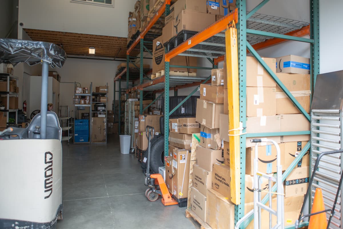 a Hagens employee stacking boxes